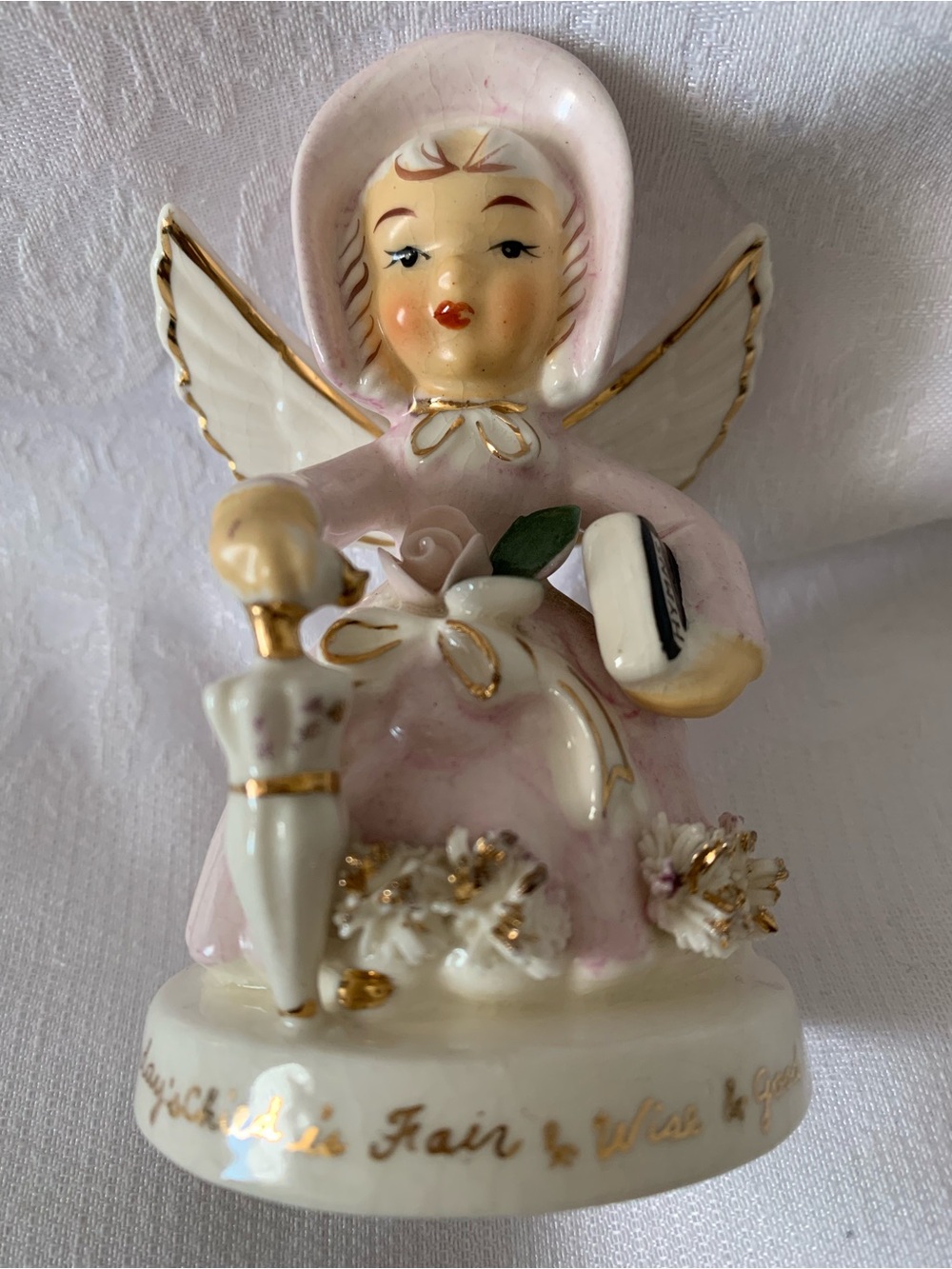 Napco Sunday’s Child Pink Porcelain Angel Figurine with Hymn book & Umbrella